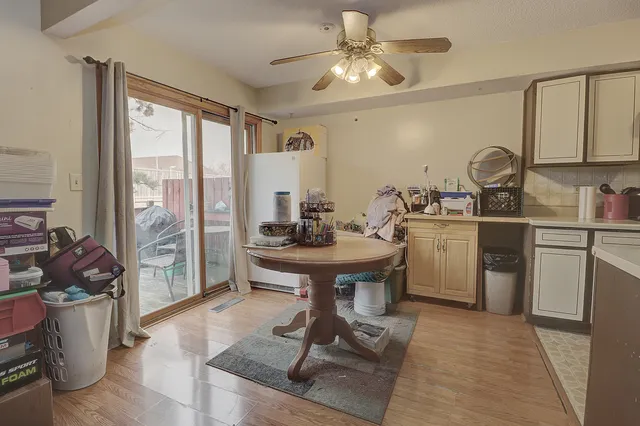 a kitchen with stainless steel appliances granite countertop a stove a refrigerator and a sink