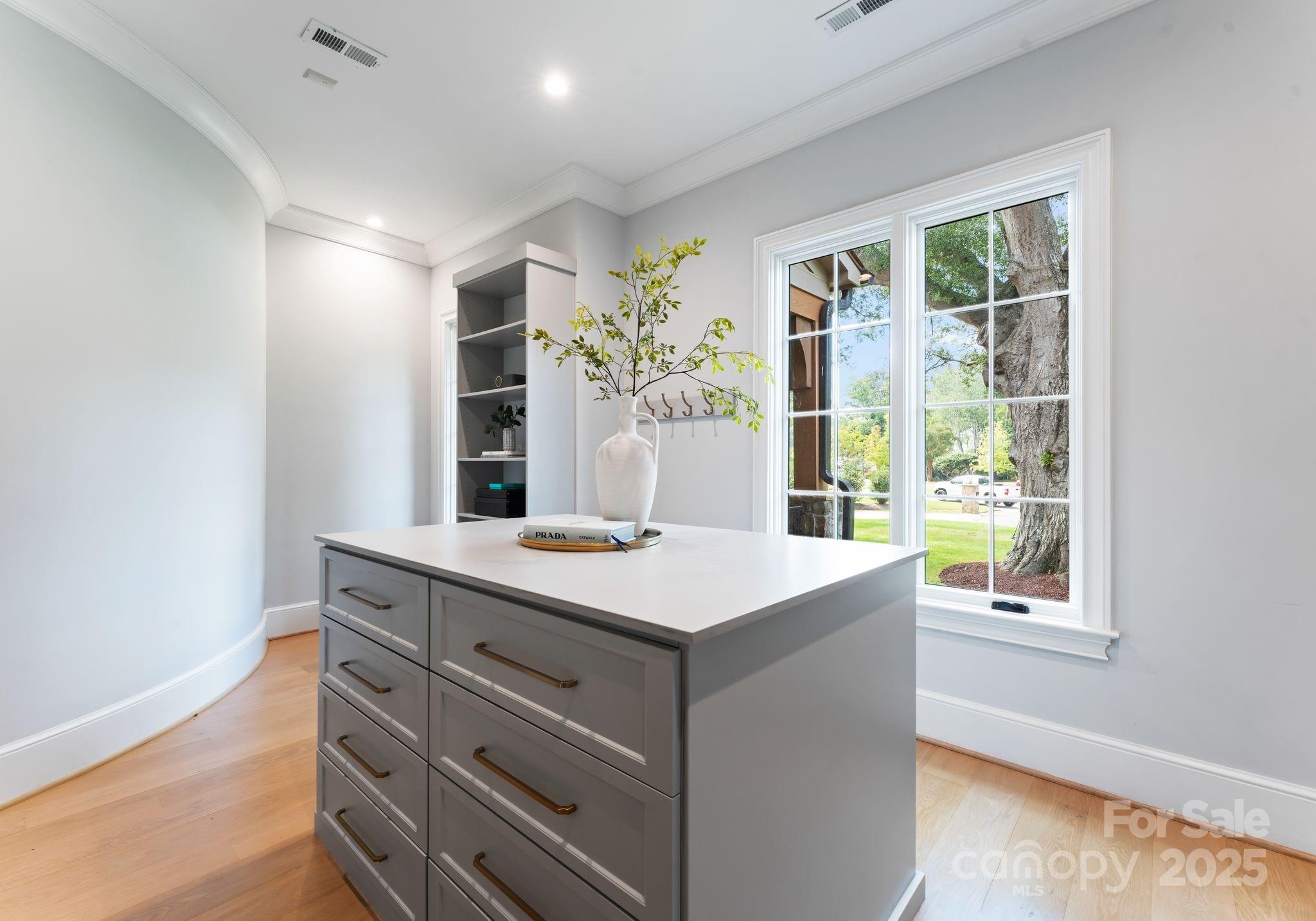 4019 River Ridge Road Charlotte, NC 28226 - Photo 18 of 39 a room with a desk and a window
