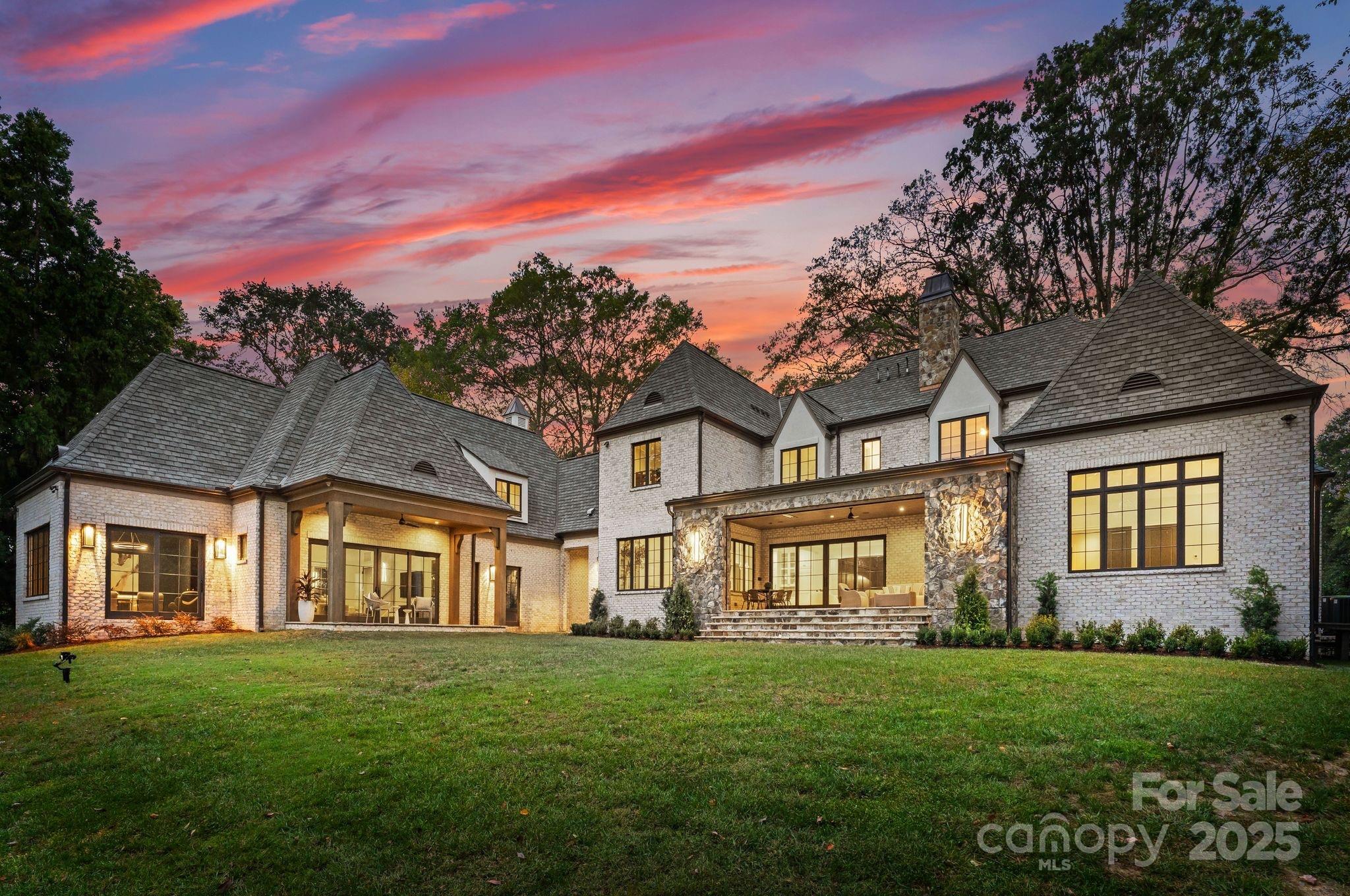 4019 River Ridge Road Charlotte, NC 28226 - Photo 35 of 39 a front view of a house with a garden