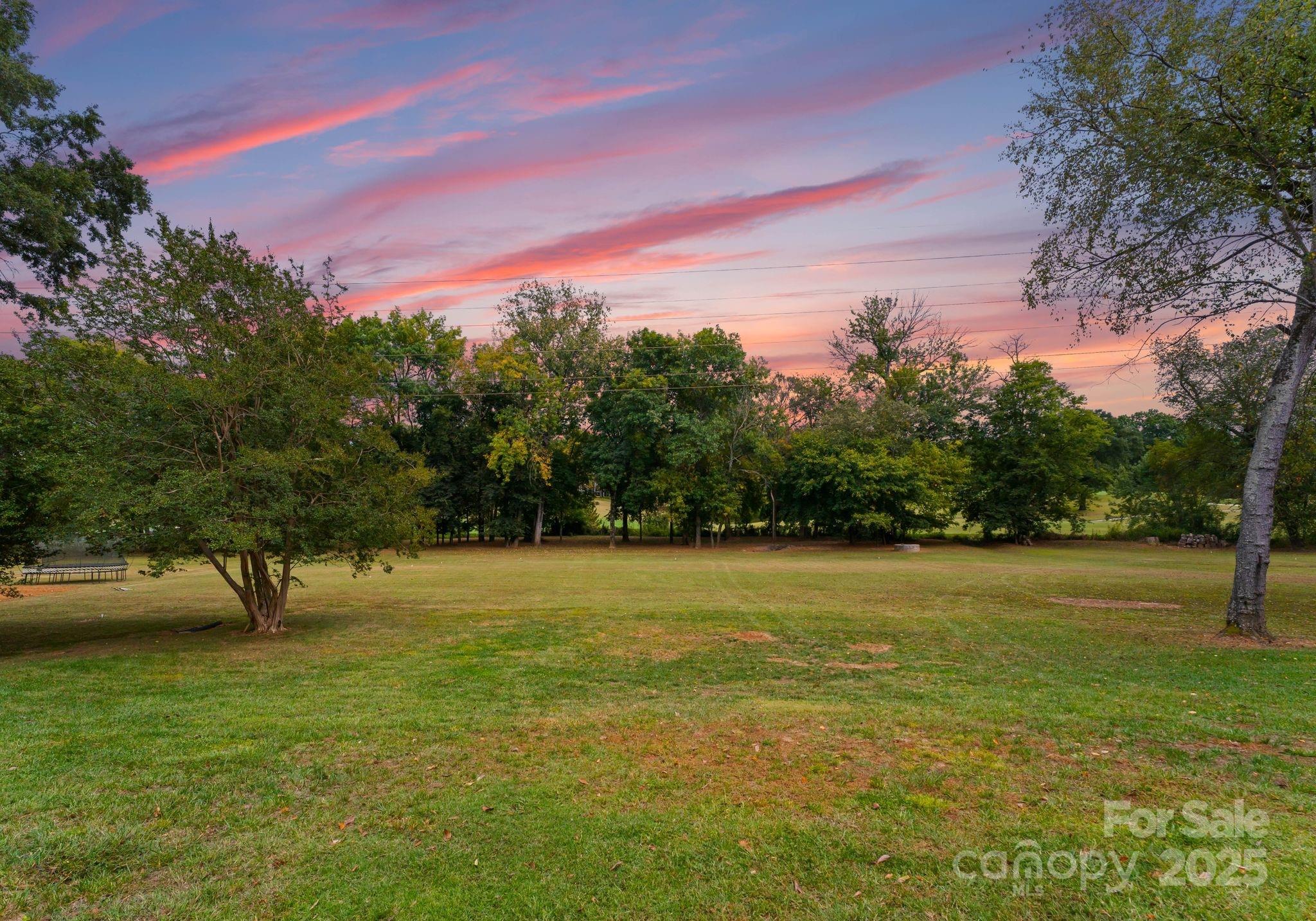 4019 River Ridge Road Charlotte, NC 28226 - Photo 37 of 39 a view of outdoor space with deck and trees