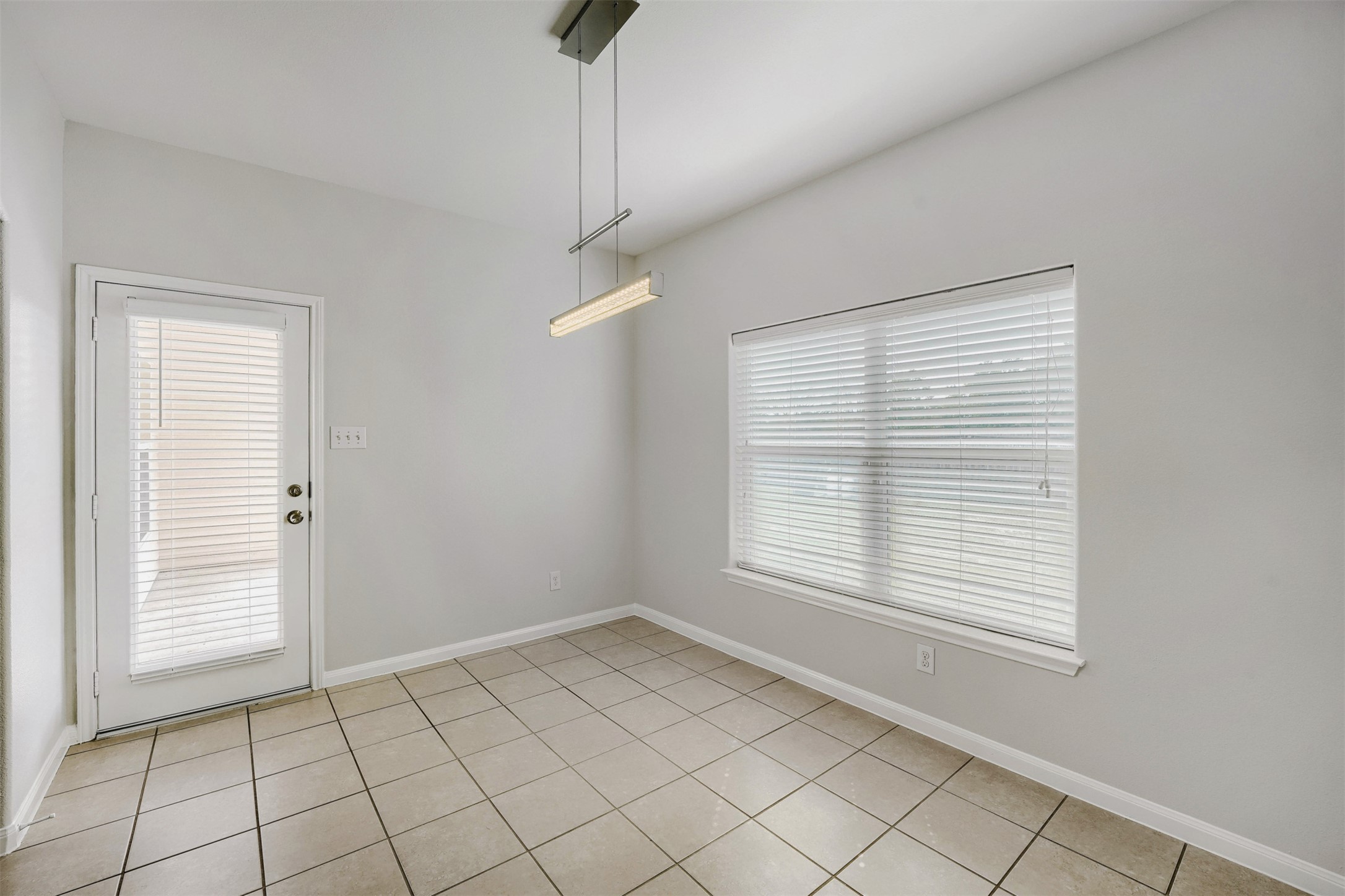 13408 Clara Martin Road Manor, TX 78653 - Photo 12 of 27 a view of an empty room with a window