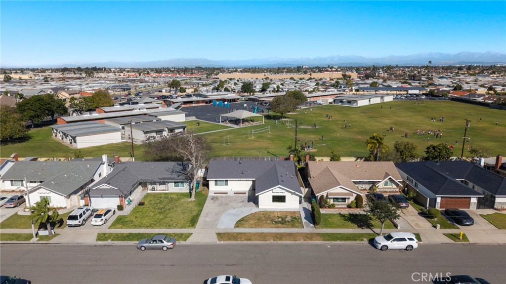 9561 Cardinal Avenue Westminster, CA 92683 - Photo 26 of 34 Additional highlights include direct access to the finished garage with epoxy flooring and washer/dryer hookups.