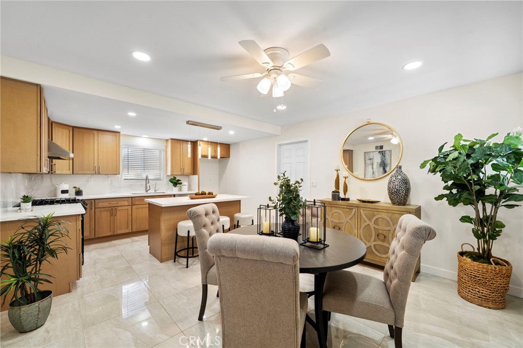 9561 Cardinal Avenue Westminster, CA 92683 - Photo 4 of 34 Designer Details, including contemporary Lighting Elements Make This Large Formal Dining Space a Special Place to Entertain Family and Friends