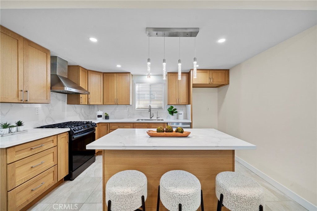 9561 Cardinal Avenue Westminster, CA 92683 - Photo 7 of 34 Remolded Kitchen has plenty of Cabinet and Counter Space. Upgraded/Turnkey Ready