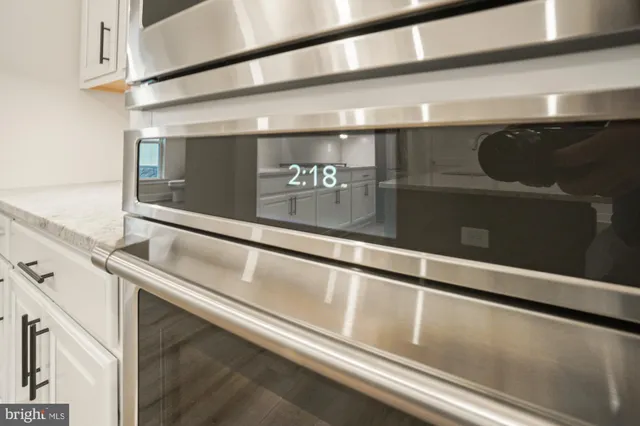 a kitchen with a stove and a sink