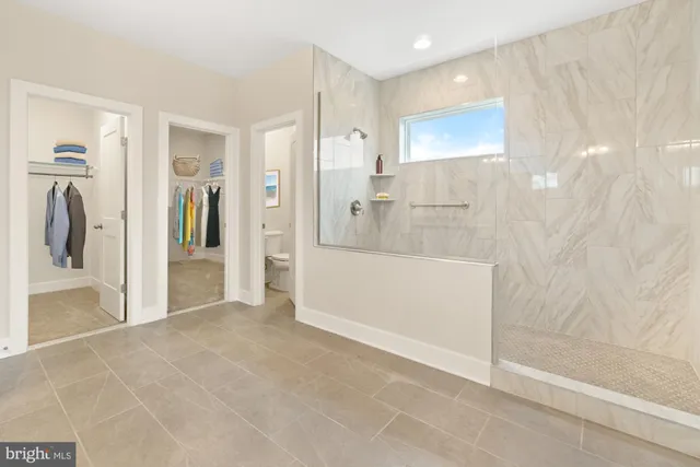 a view of a bathroom with a bathtub