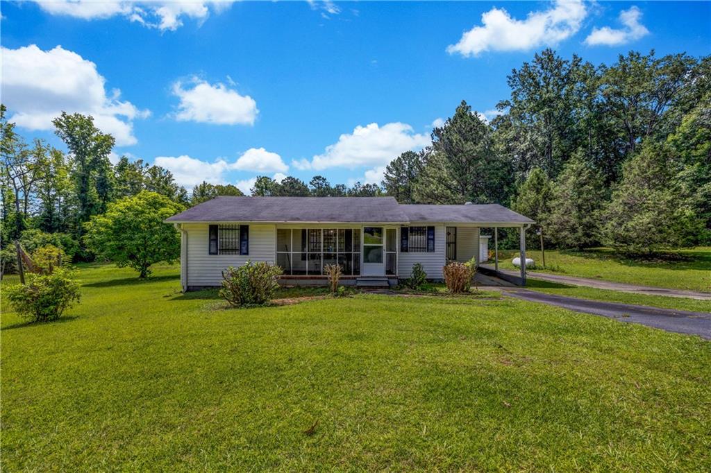 2137 Brownlee Road Jackson, GA 30233 - Photo 1 of 1 a view of a house with a yard