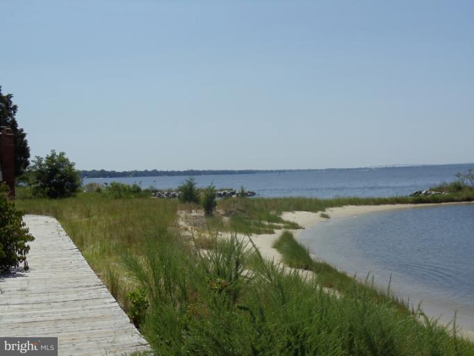 7250 Mackall Road St. Leonard, MD 20685 - Photo 20 of 27 a view of a lake from a balcony