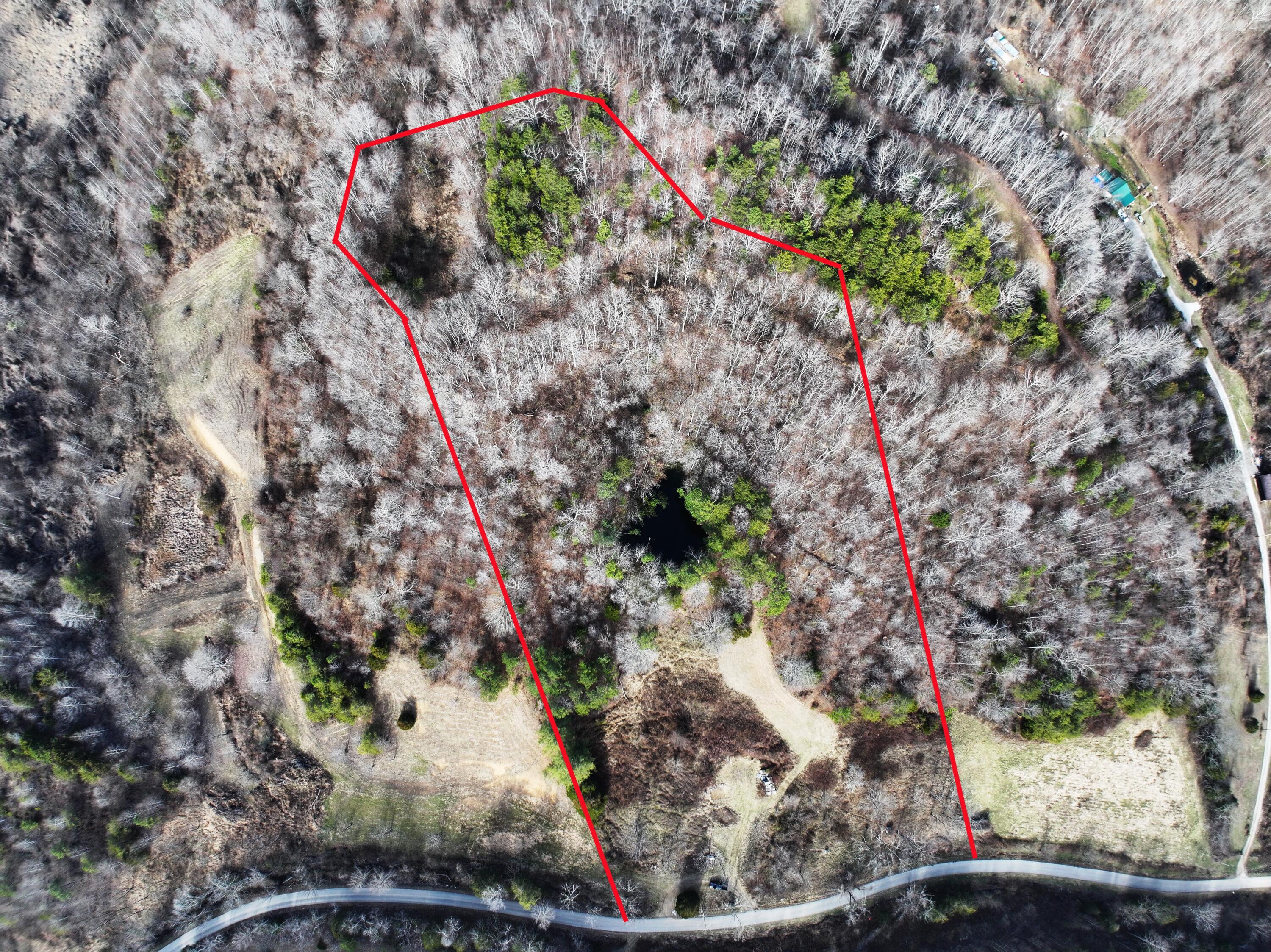 9999 Judd Road Booneville, KY 41314 - Photo 1 of 13 Approximate surveyed boundary lines shown outlining this 17.75-acre wooded tract with road frontage and multiple potential build or recreation sites!