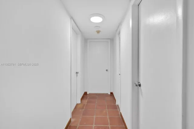 a view of hallway with windows