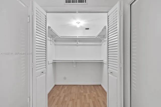 a view of a room with racks on the wall