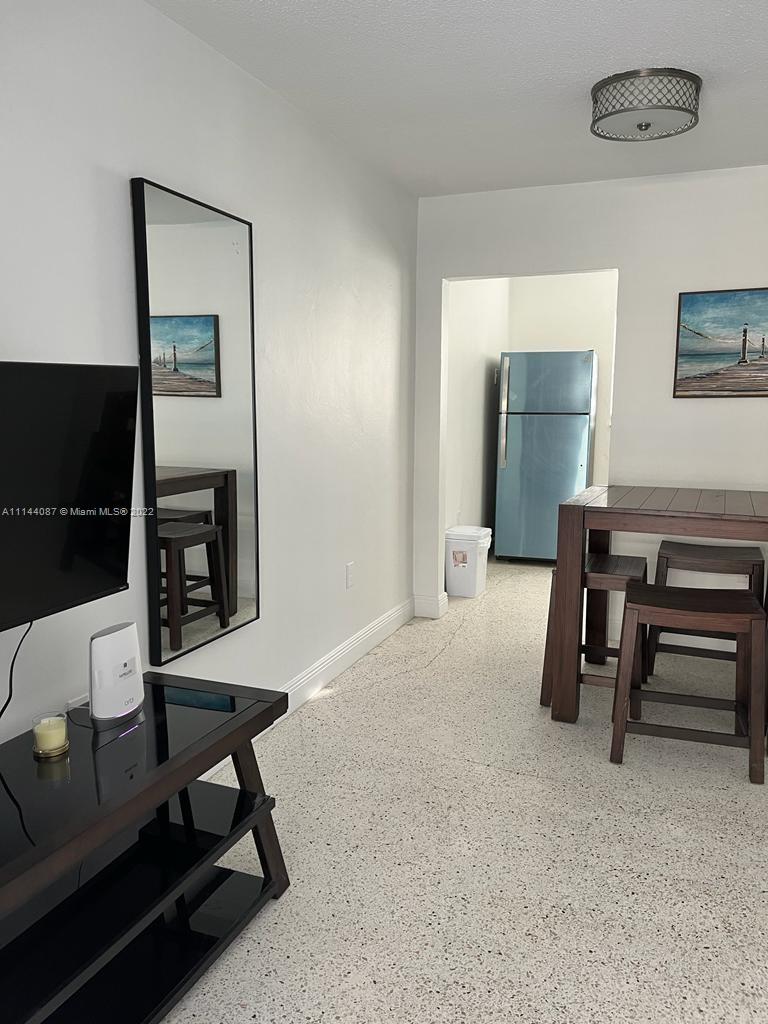 a workspace with furniture and window