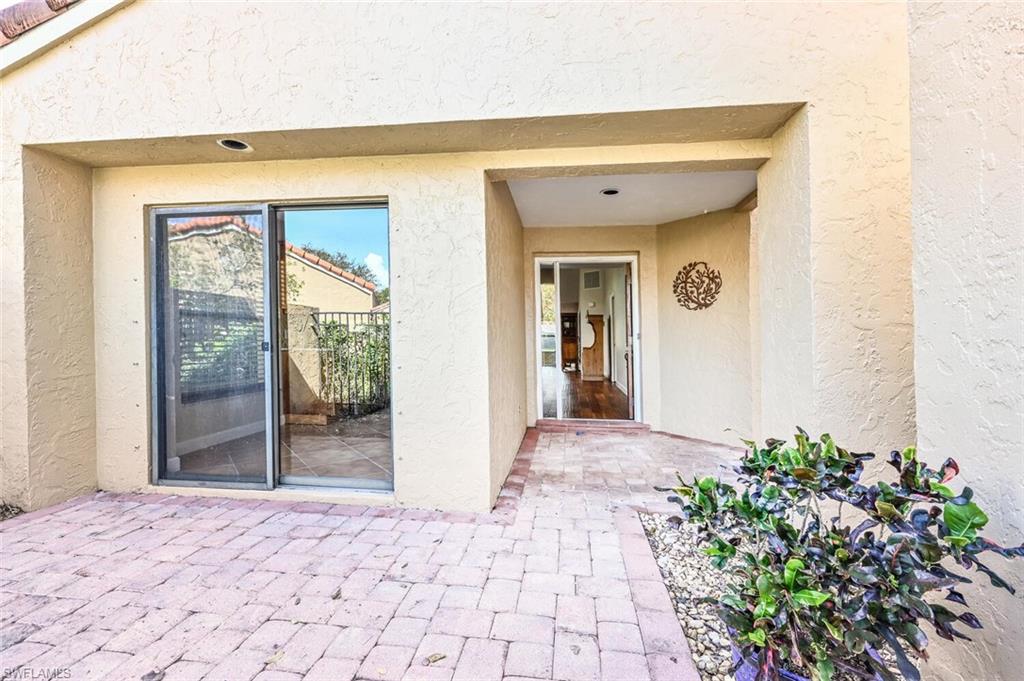 869 Reef Point Circle, Unit 26 Naples, FL 34108 - Photo 2 of 29 Front Porch/Entrance