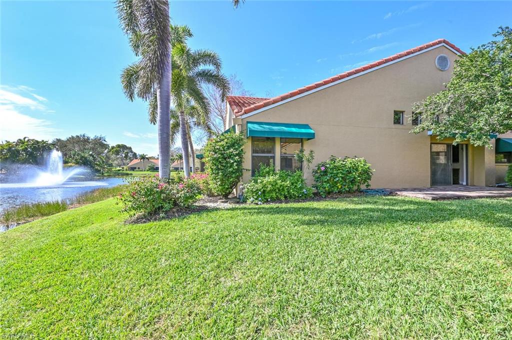 869 Reef Point Circle, Unit 26 Naples, FL 34108 - Photo 23 of 29 Side Yard