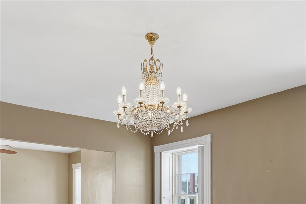 96 Washington Square East, Unit 2 Salem, MA 01970 - Photo 19 of 40 a view of a chandelier in a room