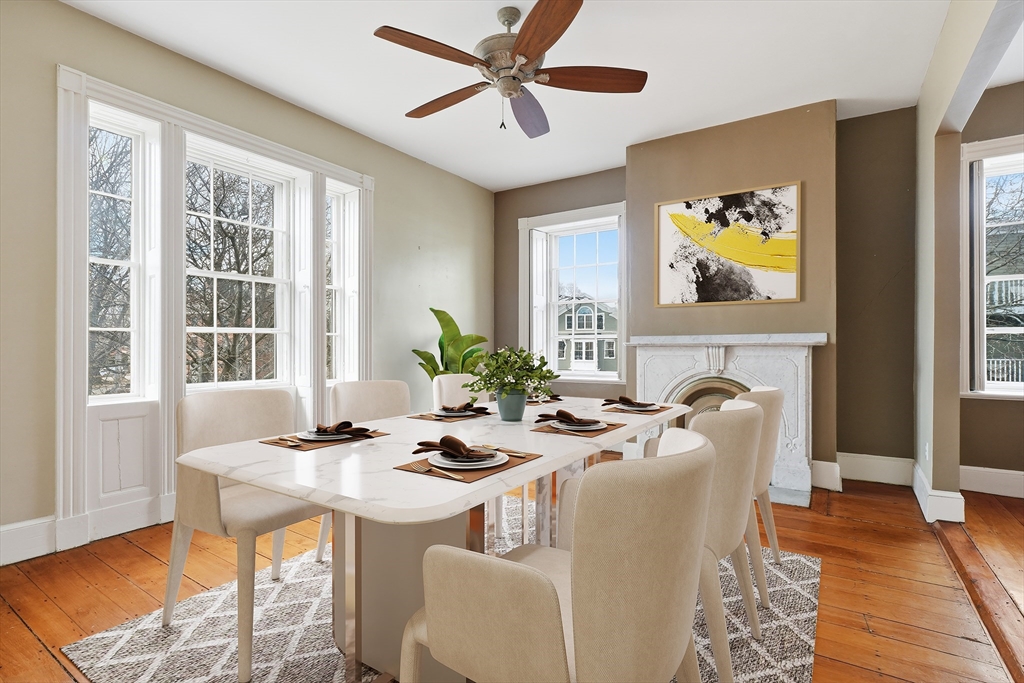 96 Washington Square East, Unit 2 Salem, MA 01970 - Photo 6 of 40 a dining room with furniture a window and wooden floor