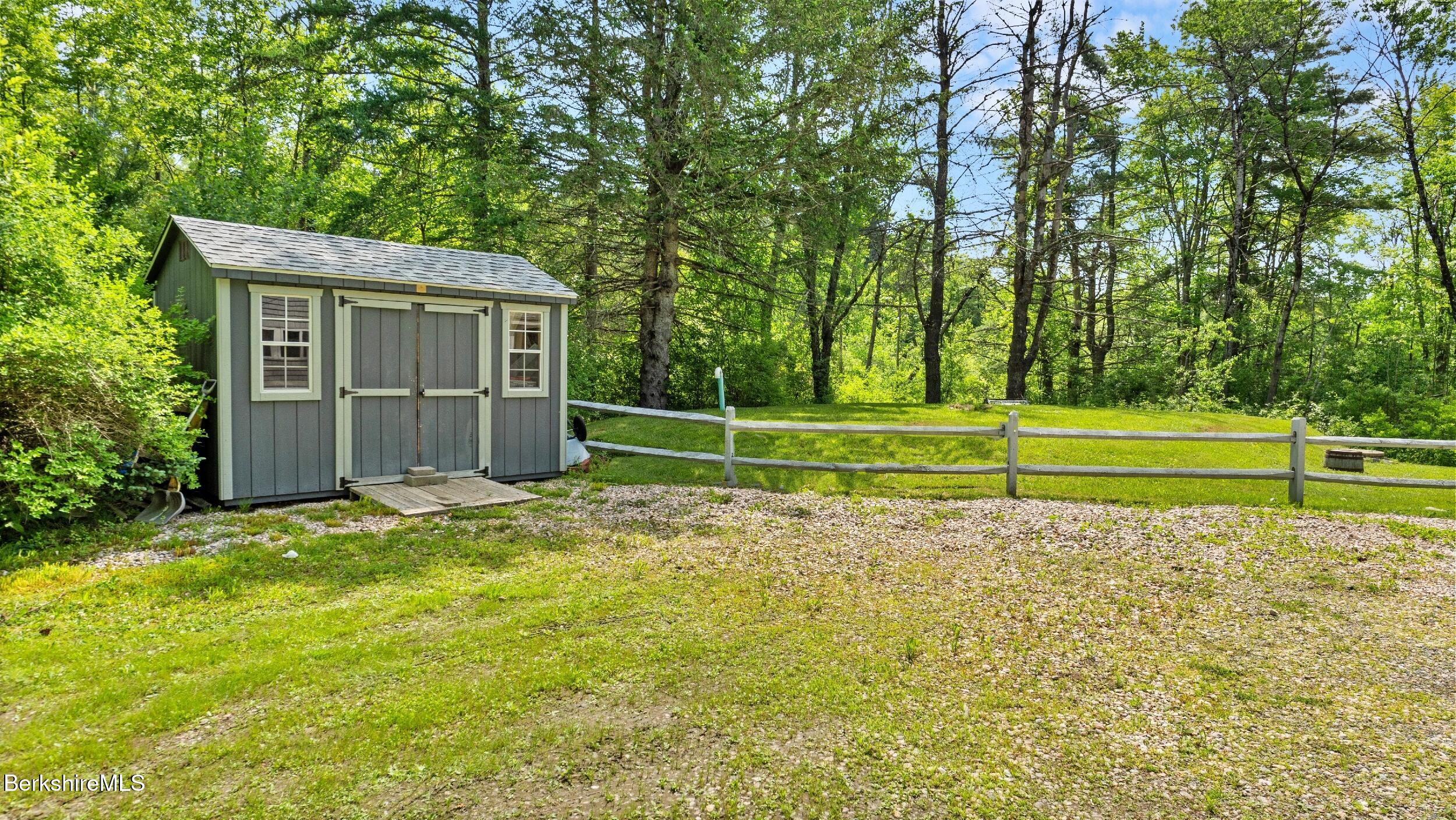 418 Monterey Road Great Barrington, MA 01230 - Photo 26 of 28 a view of a house with a yard