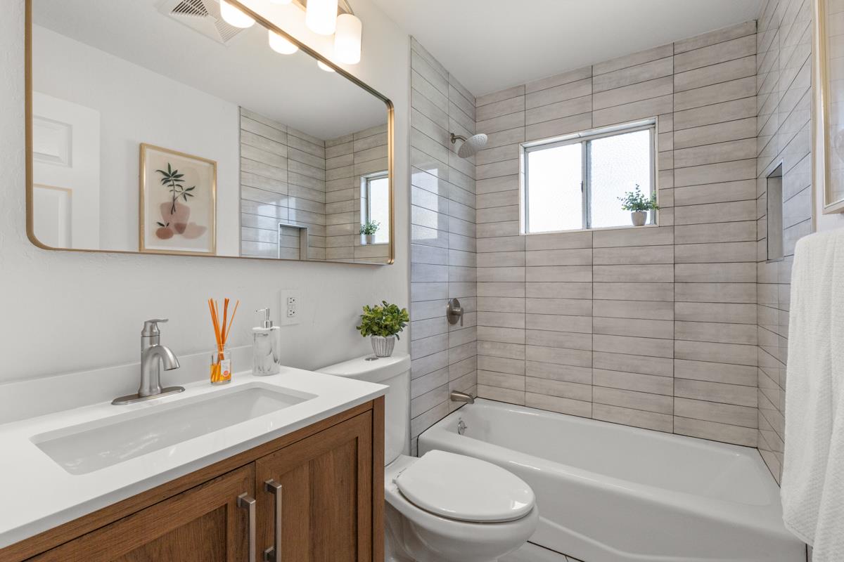 383 Monterey Road Pacifica, CA 94044 - Photo 18 of 33 a bathroom with a sink toilet and shower