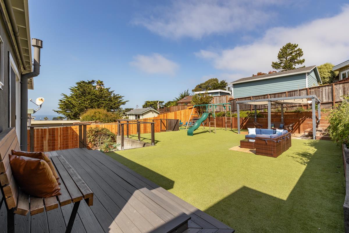 383 Monterey Road Pacifica, CA 94044 - Photo 21 of 33 a view of a swimming pool with a patio
