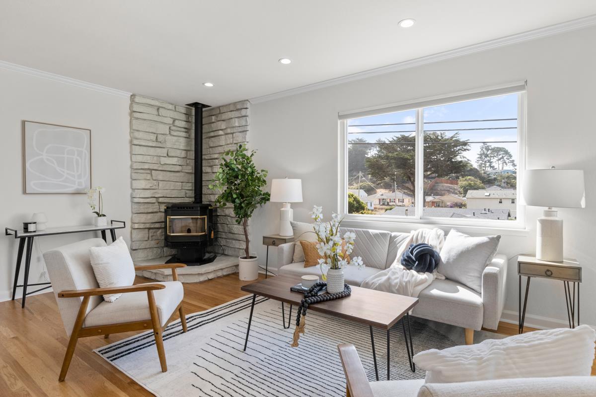 383 Monterey Road Pacifica, CA 94044 - Photo 4 of 33 a living room with furniture and a large window
