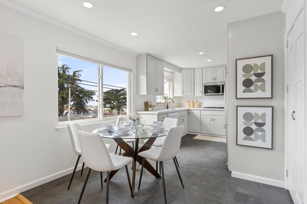 383 Monterey Road Pacifica, CA 94044 - Photo 5 of 33 a dining room with furniture and window