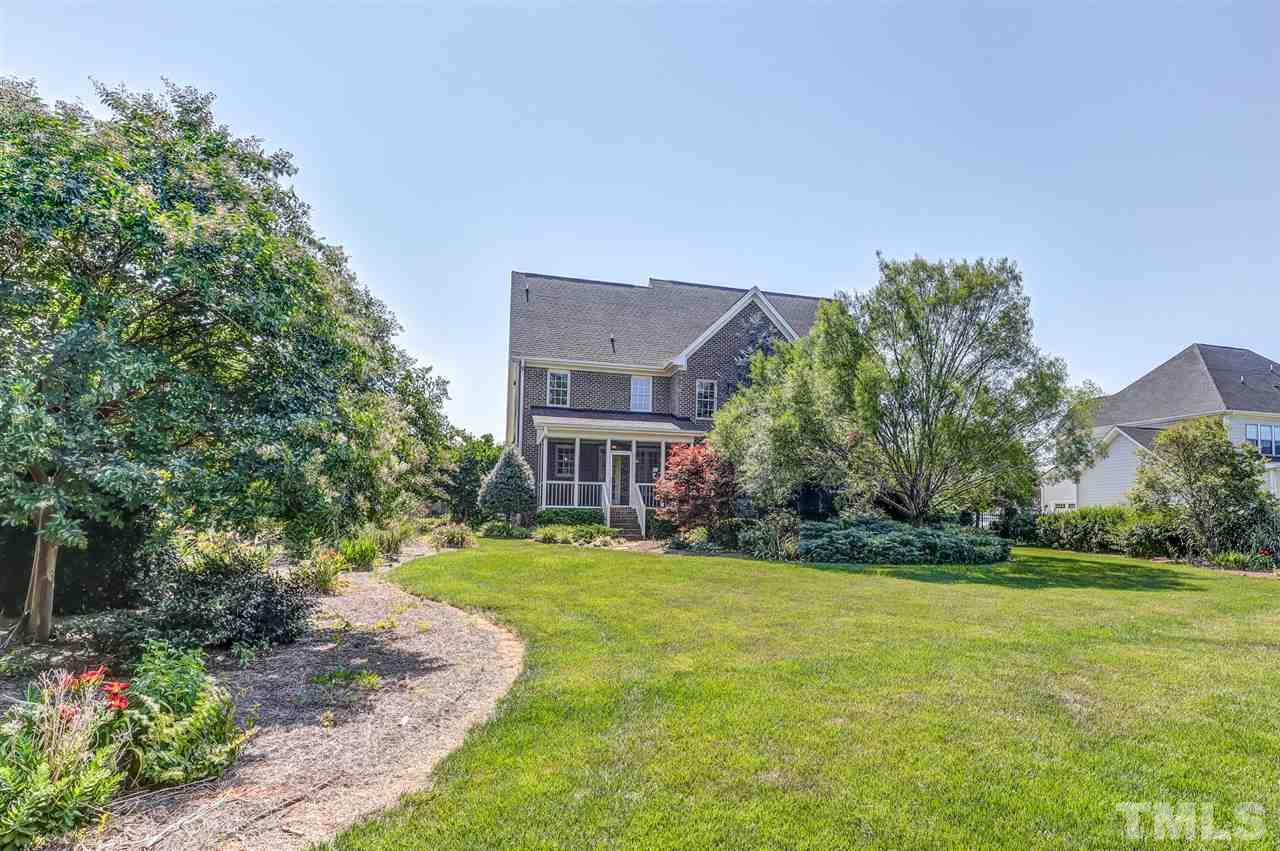 3312 Cotten Road Raleigh, NC 27603 - Photo 3 of 30 Lot is beautifully landscaped!! Fenced back yard!