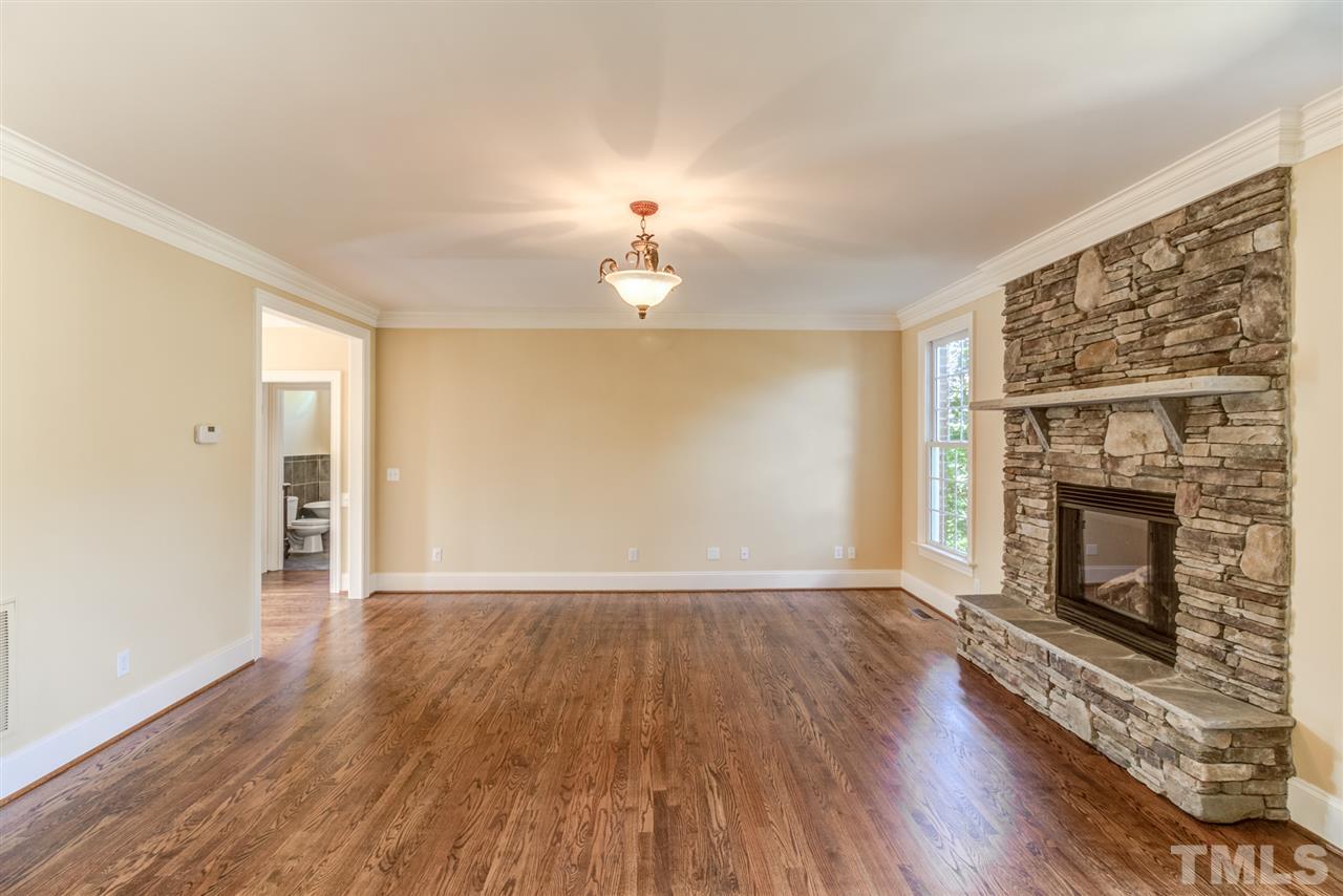 3312 Cotten Road Raleigh, NC 27603 - Photo 8 of 30 Beautiful hardwoods and fireplace with gas logs in Family Room.