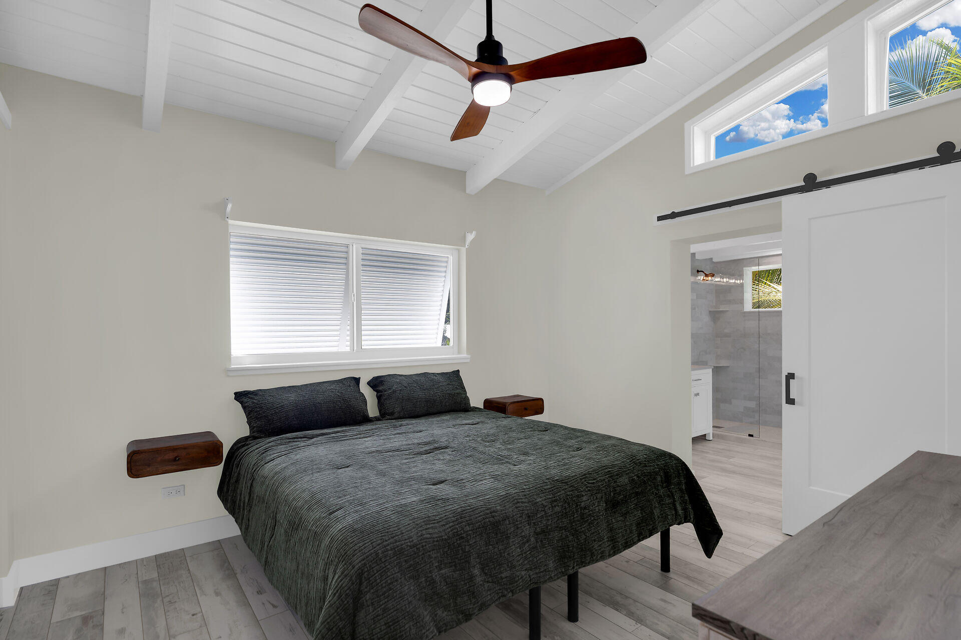 147 Sioux Street Tavernier, FL 33070 - Photo 15 of 41 a bedroom with a large bed and a window