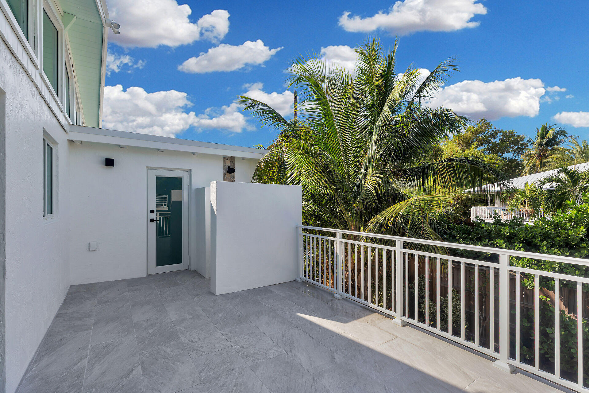 147 Sioux Street Tavernier, FL 33070 - Photo 19 of 41 a view of a house with a flower garden
