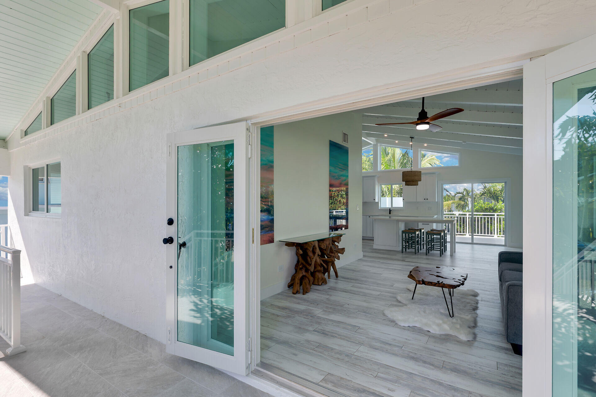 147 Sioux Street Tavernier, FL 33070 - Photo 3 of 41 a living room with furniture and a wooden floor