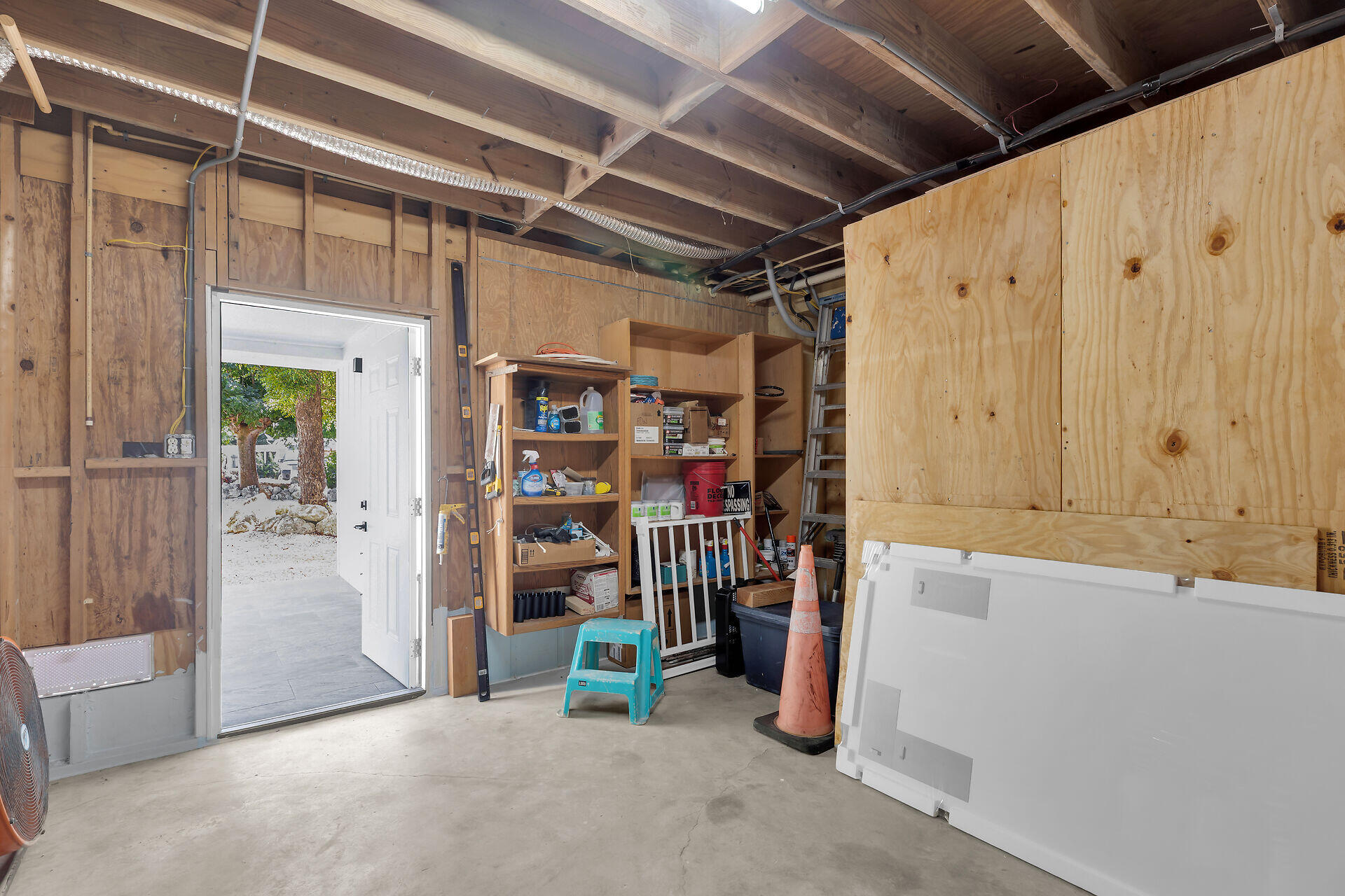 147 Sioux Street Tavernier, FL 33070 - Photo 41 of 41 a view of empty room with wooden walls