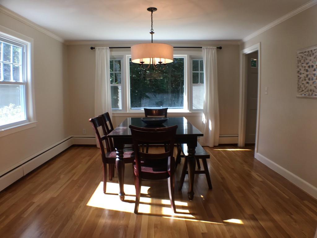 71 Stonebridge Road Wayland, MA 01778 - Photo 7 of 23 a dining room with furniture window wooden floor
