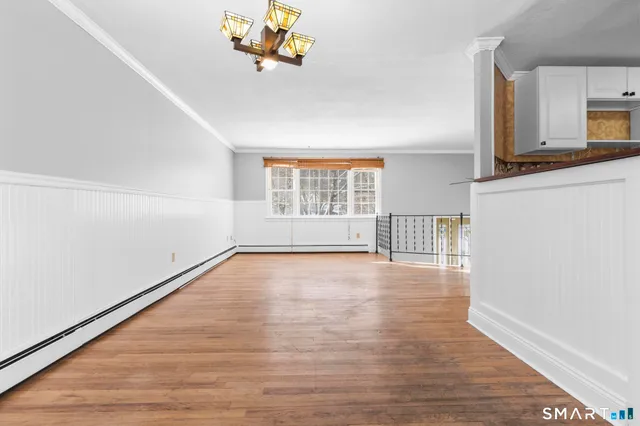 a kitchen with stainless steel appliances wooden cabinets and a sink