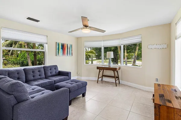 a living room with furniture and a window