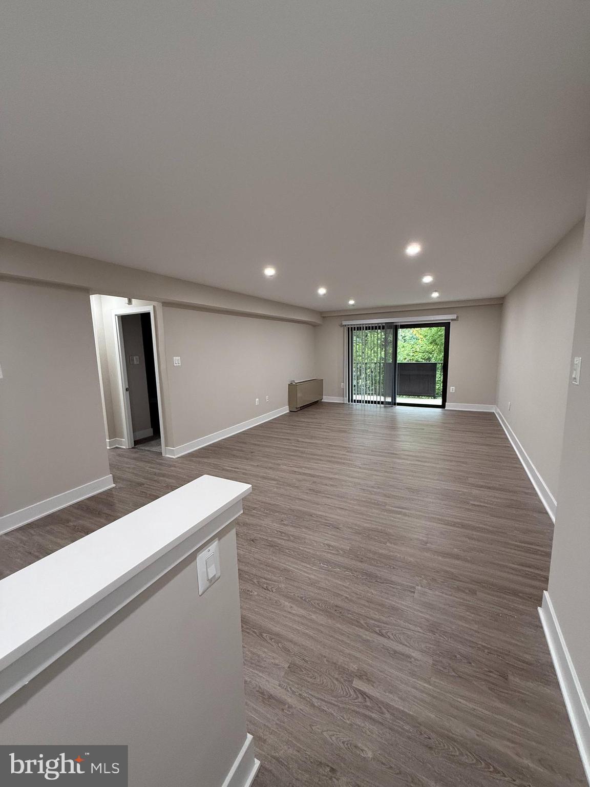 1003 Easton Road, Unit C502 Willow Grove, PA 19090 - Photo 2 of 6 a view of an empty room with wooden floor