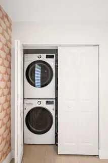 a bathroom with a toilet sink and shower