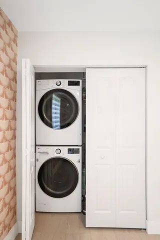 a bathroom with a toilet sink and shower