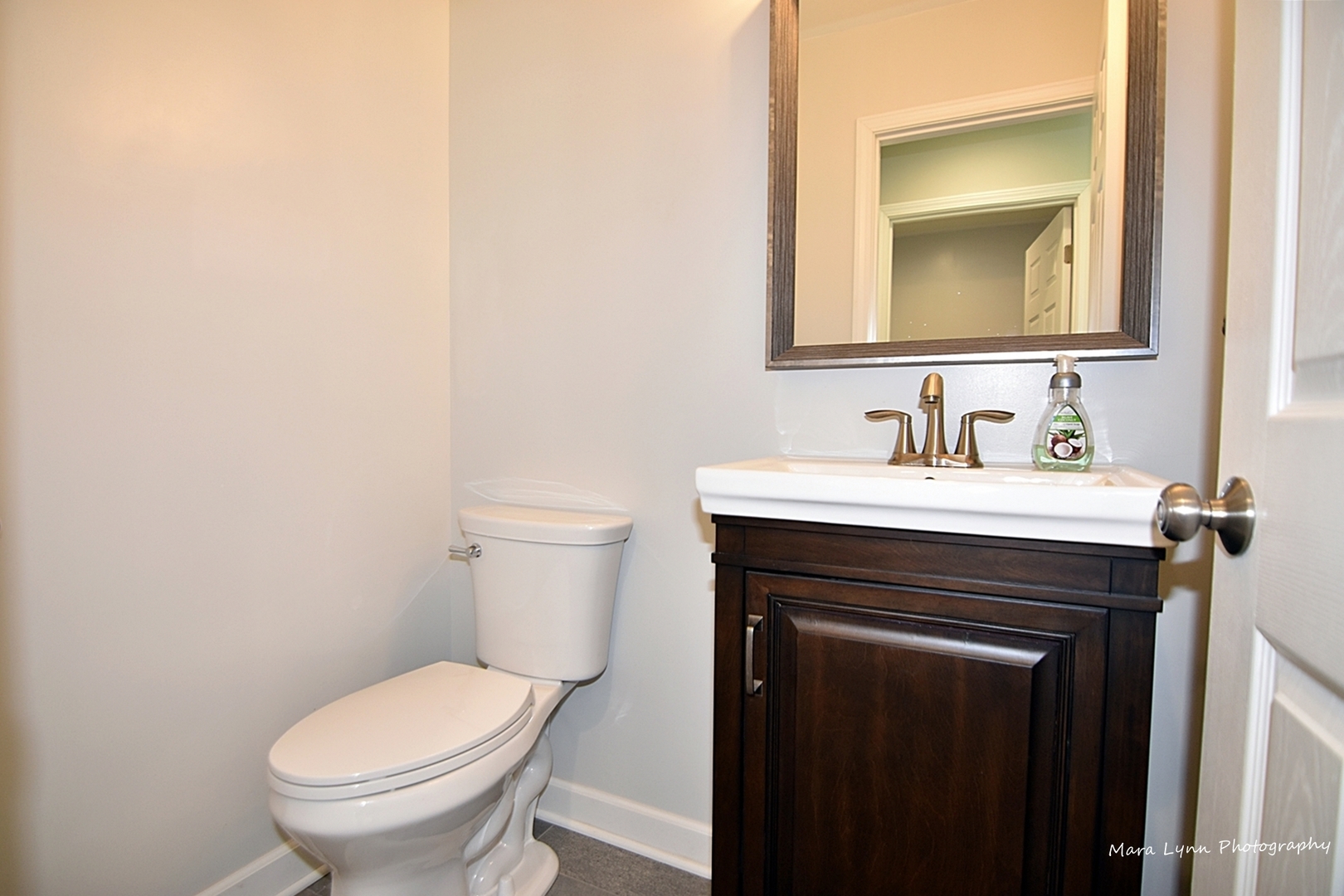 2S643 Nelson Lake Road Batavia, IL 60510 - Photo 14 of 48 a bathroom with a toilet sink and mirror