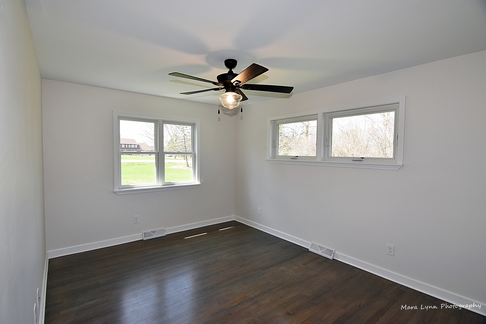 2S643 Nelson Lake Road Batavia, IL 60510 - Photo 22 of 48 a view of a livingroom with a ceiling fan and window