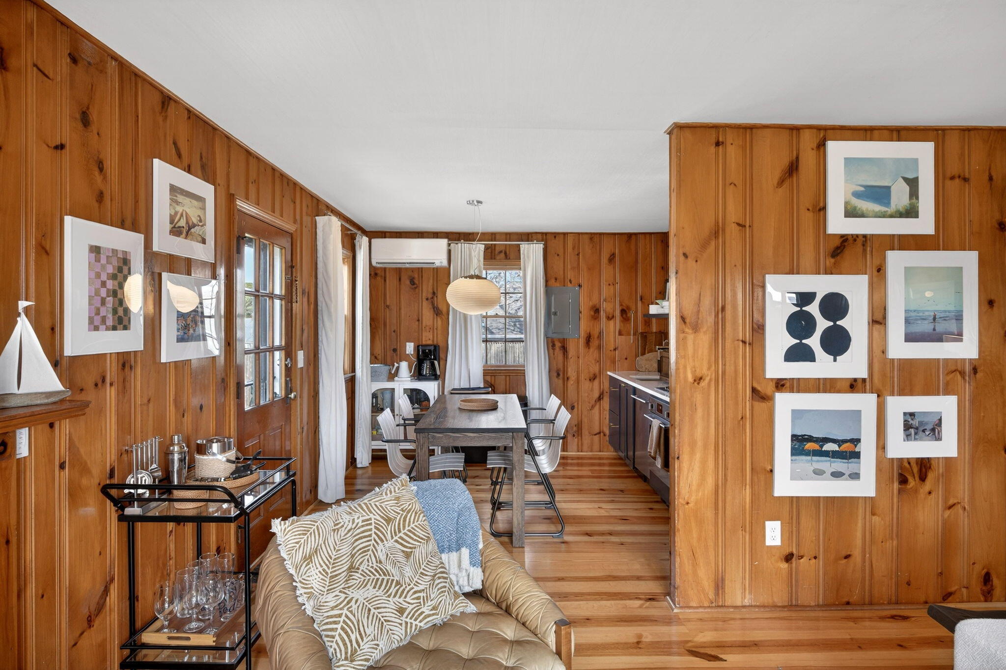 6 Manning Road Dennis Port, MA 02639 - Photo 13 of 53 a living room with furniture and a floor to ceiling window