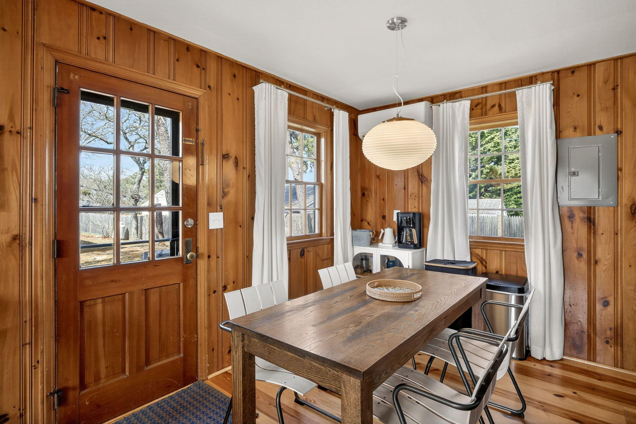 6 Manning Road Dennis Port, MA 02639 - Photo 16 of 53 a view of a dining room with furniture window and wooden floor