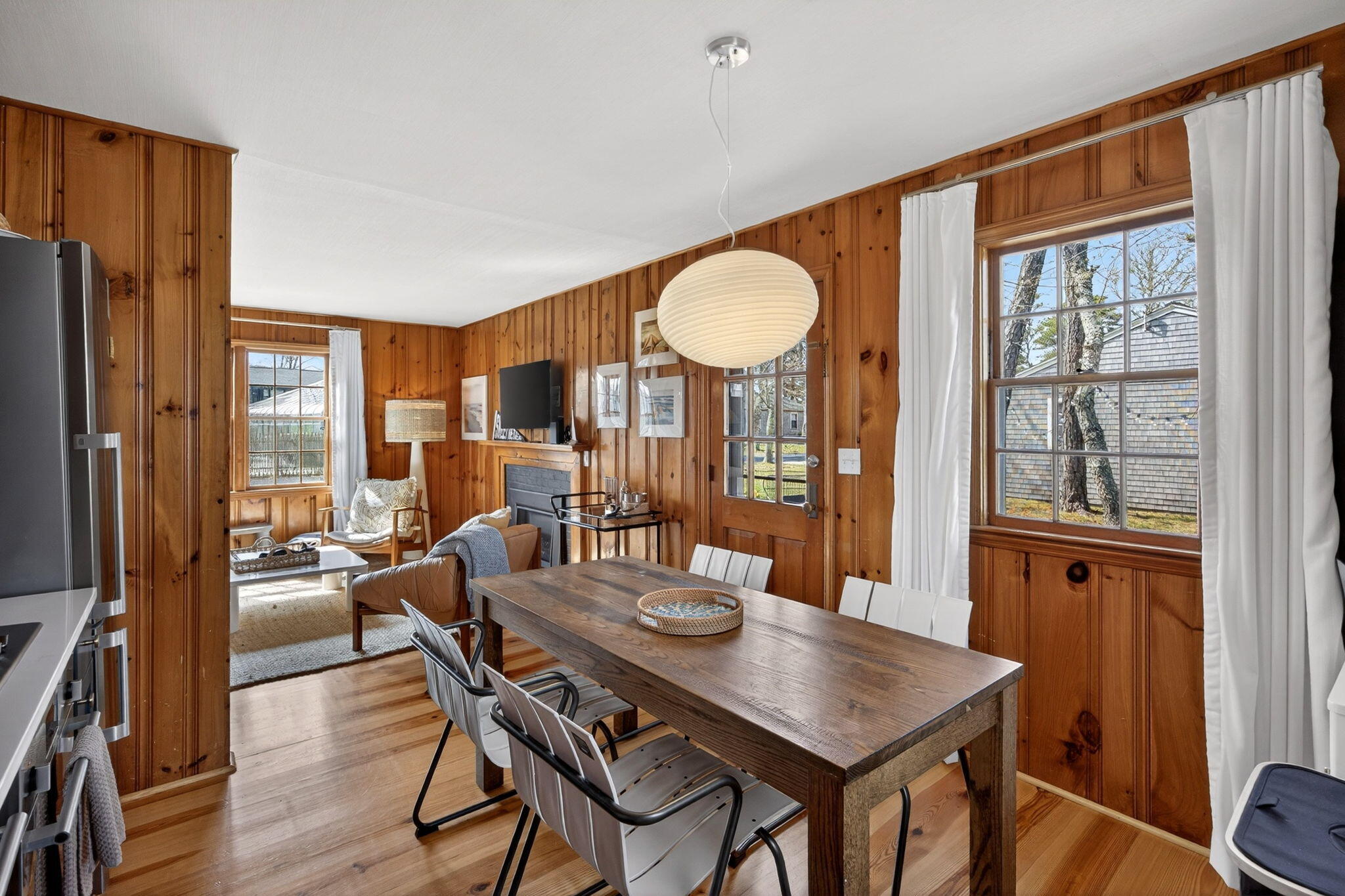 6 Manning Road Dennis Port, MA 02639 - Photo 17 of 53 a view of a dining room with furniture window and wooden floor