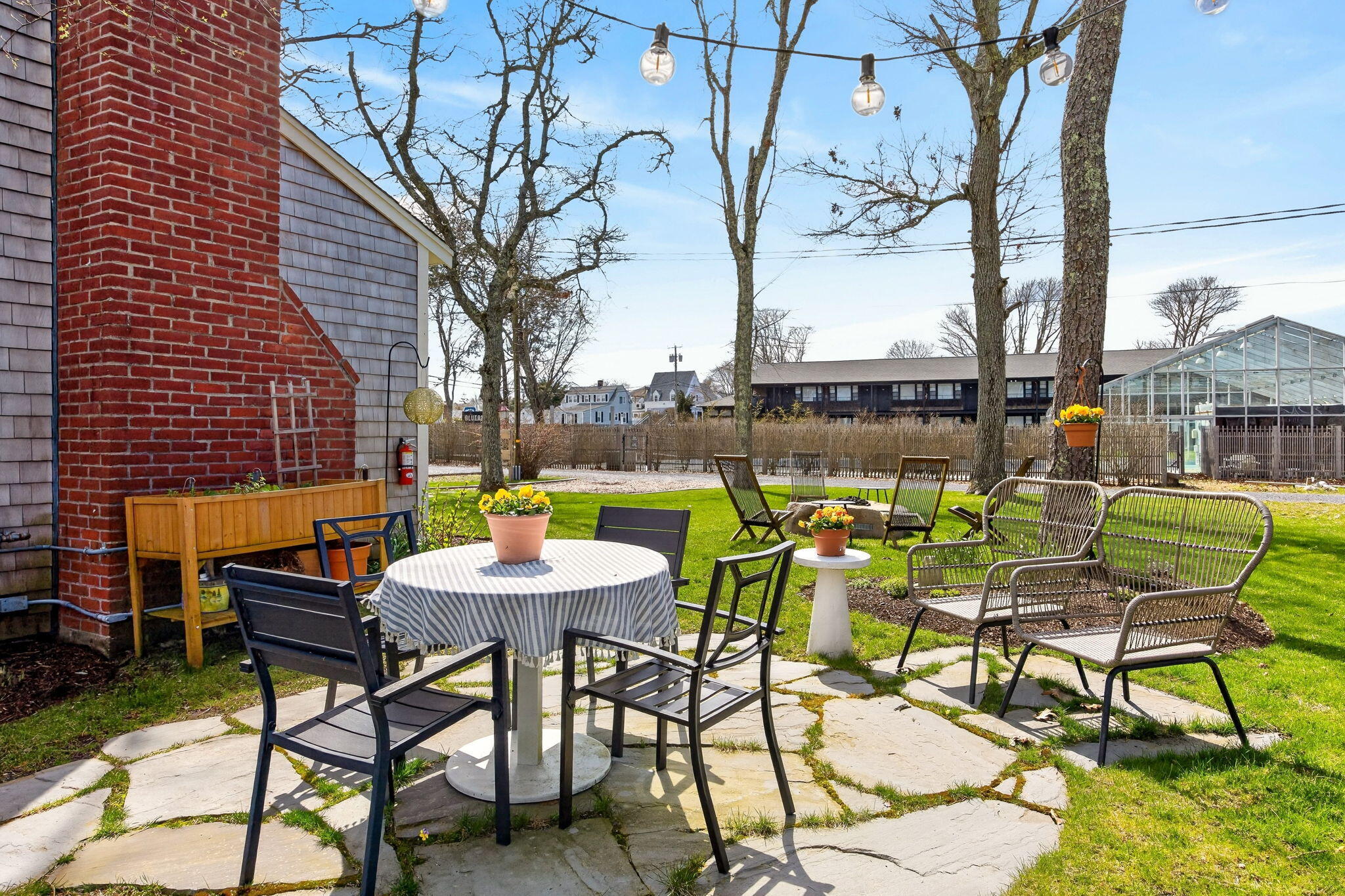 6 Manning Road Dennis Port, MA 02639 - Photo 2 of 53 a view of a chairs and table in patio