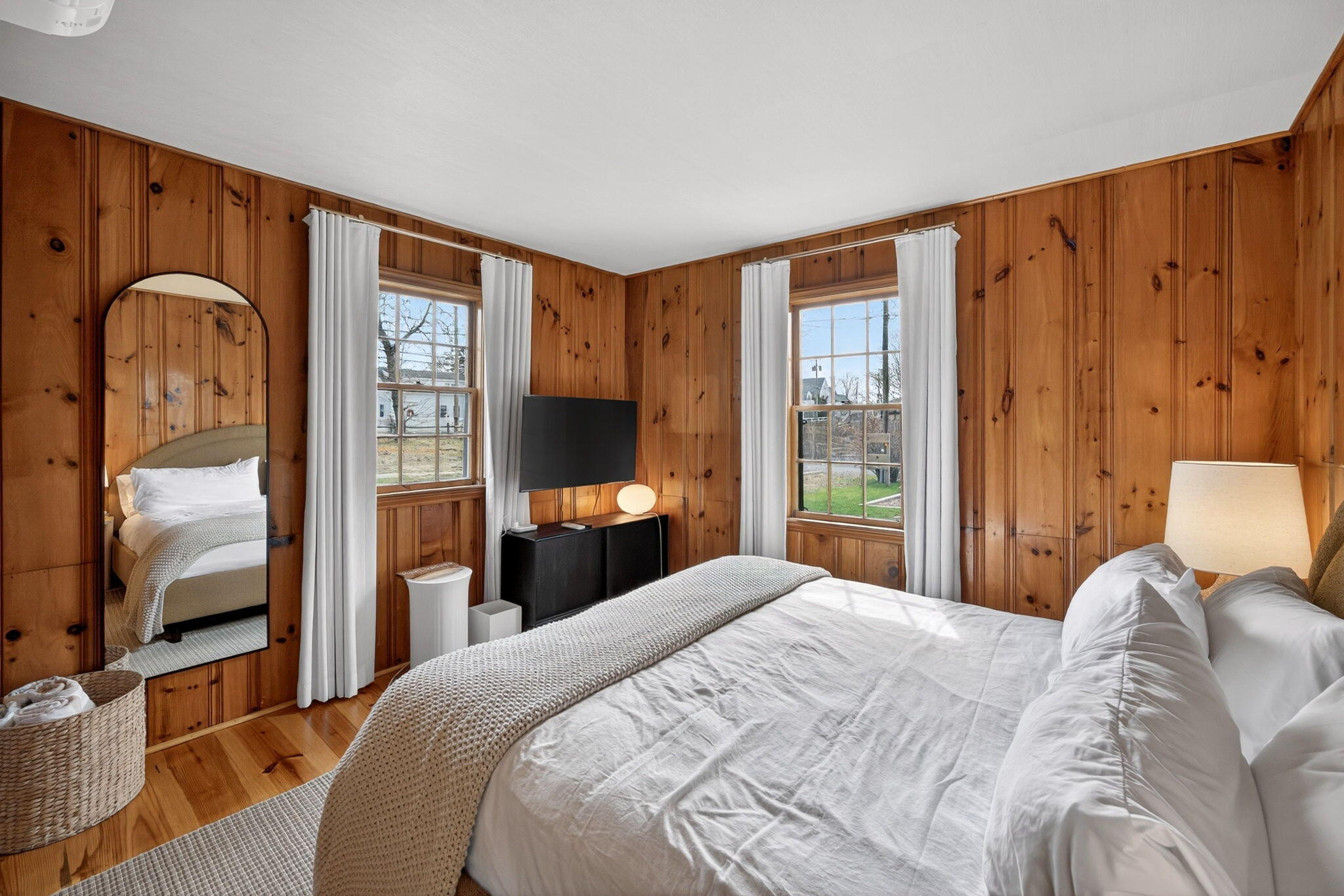 6 Manning Road Dennis Port, MA 02639 - Photo 21 of 53 a bedroom with a bed and wooden floor