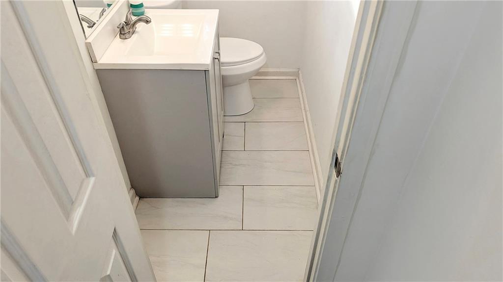 3340 Pinehill Drive Decatur, GA 30032 - Photo 11 of 15 a bathroom with a sink and mirror