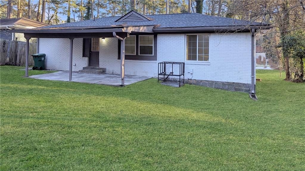 3340 Pinehill Drive Decatur, GA 30032 - Photo 15 of 15 a front view of a house with a yard