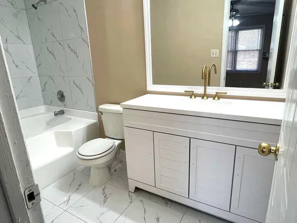 a bathroom with a sink and a toilet