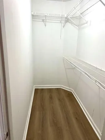 a view of a room with racks on the wall