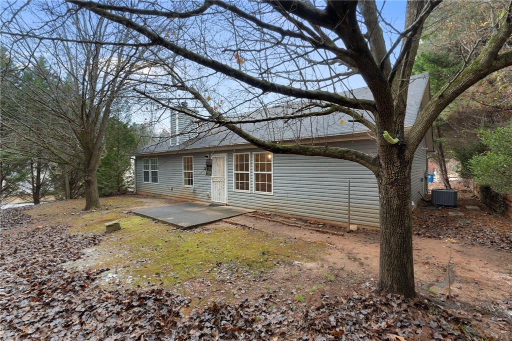 7815 Ridge Top Terrace Douglasville, GA 30134 - Photo 29 of 31 a view of a house with a yard covered in snow