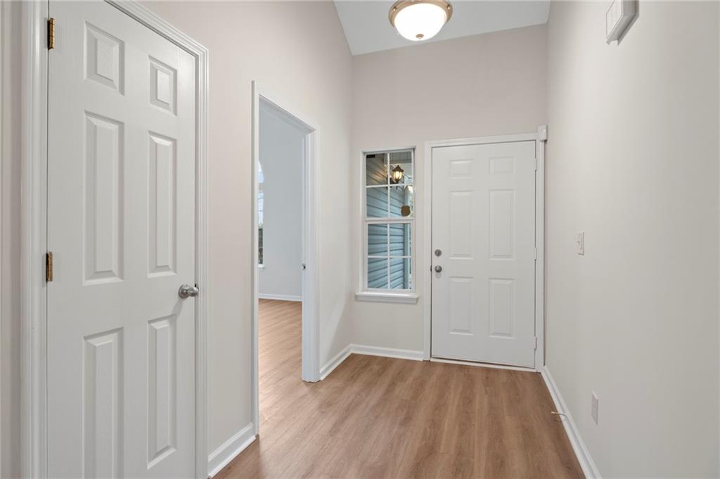 7815 Ridge Top Terrace Douglasville, GA 30134 - Photo 4 of 31 wooden floor in an empty room